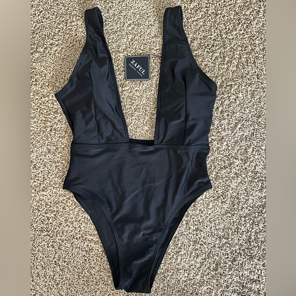 High cut, plunge neck swimsuit